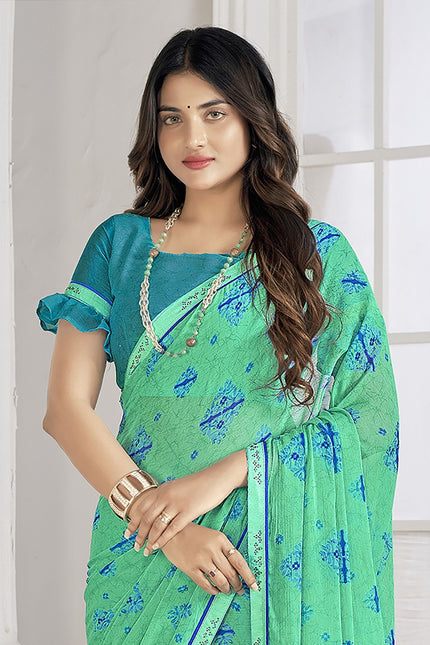 Trendy Self Printed, Chiffon saree With All Over Fancy Printed Butta And Attached Siroski Lace (Rama)