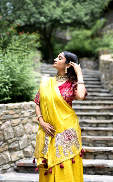 Yellow Pure Tissue Saree with Handwork Elephant Pallu