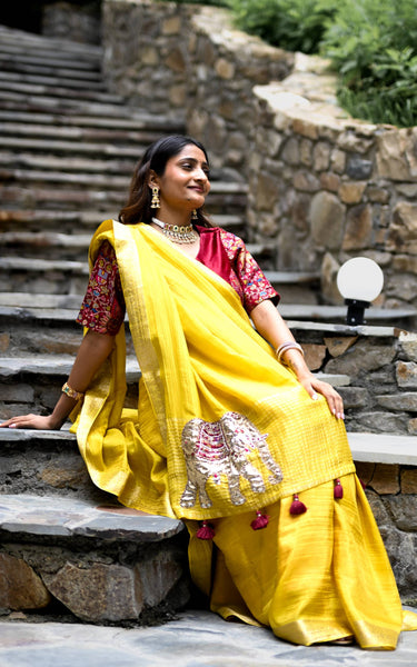 Yellow Pure Tissue Saree with Handwork Elephant Pallu