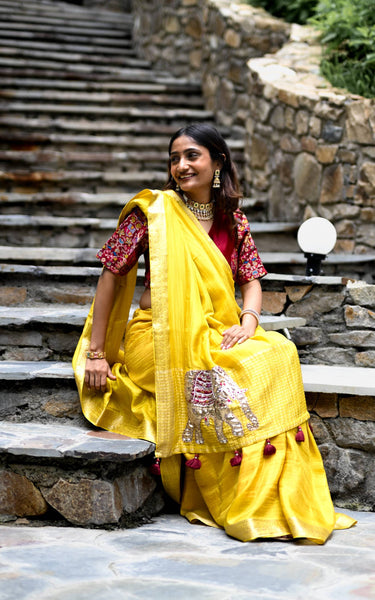Yellow Pure Tissue Saree with Handwork Elephant Pallu