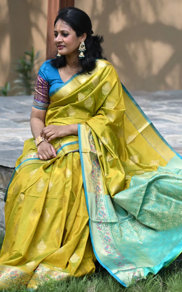 Mehendi Banarasi Silk Saree with Kalamkari Peacock Border
