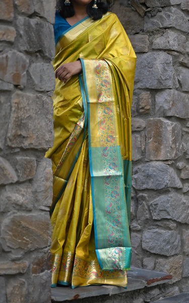 Mehendi Banarasi Silk Saree with Kalamkari Peacock Border