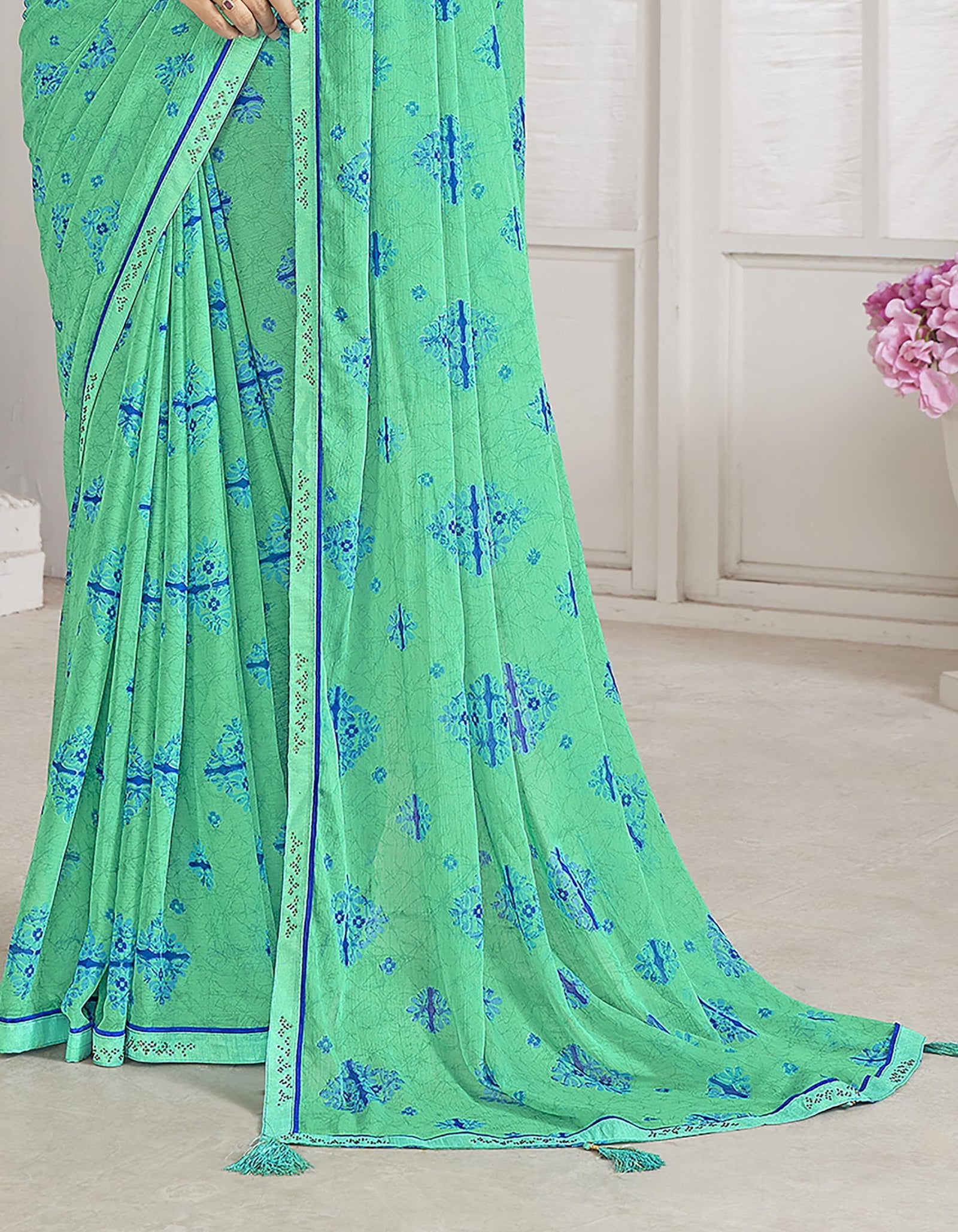 Trendy Self Printed Chiffon saree With All Over Fancy Printed Butta And Attached Siroski Lace (Green)