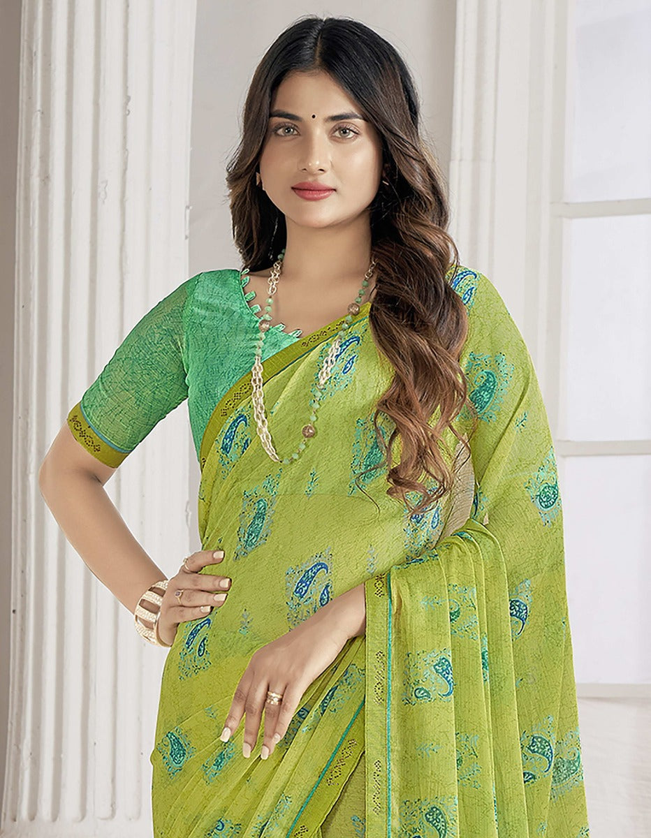 Trendy Self Printed Chiffon saree With All Over Fancy Printed Butta And Attached Siroski Lace (Green)
