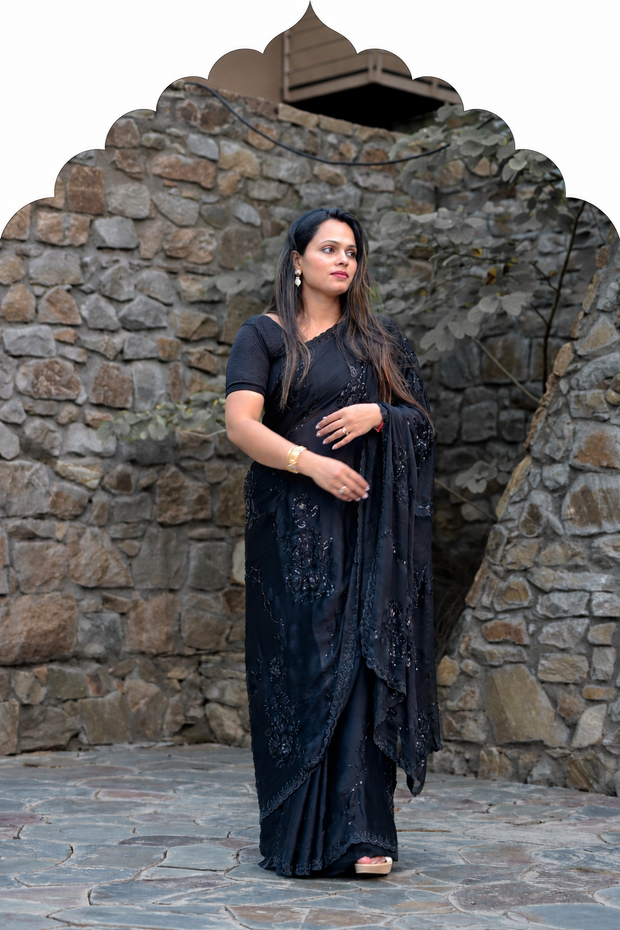 Woman in black party wear saree - Party Wear Sarees collection